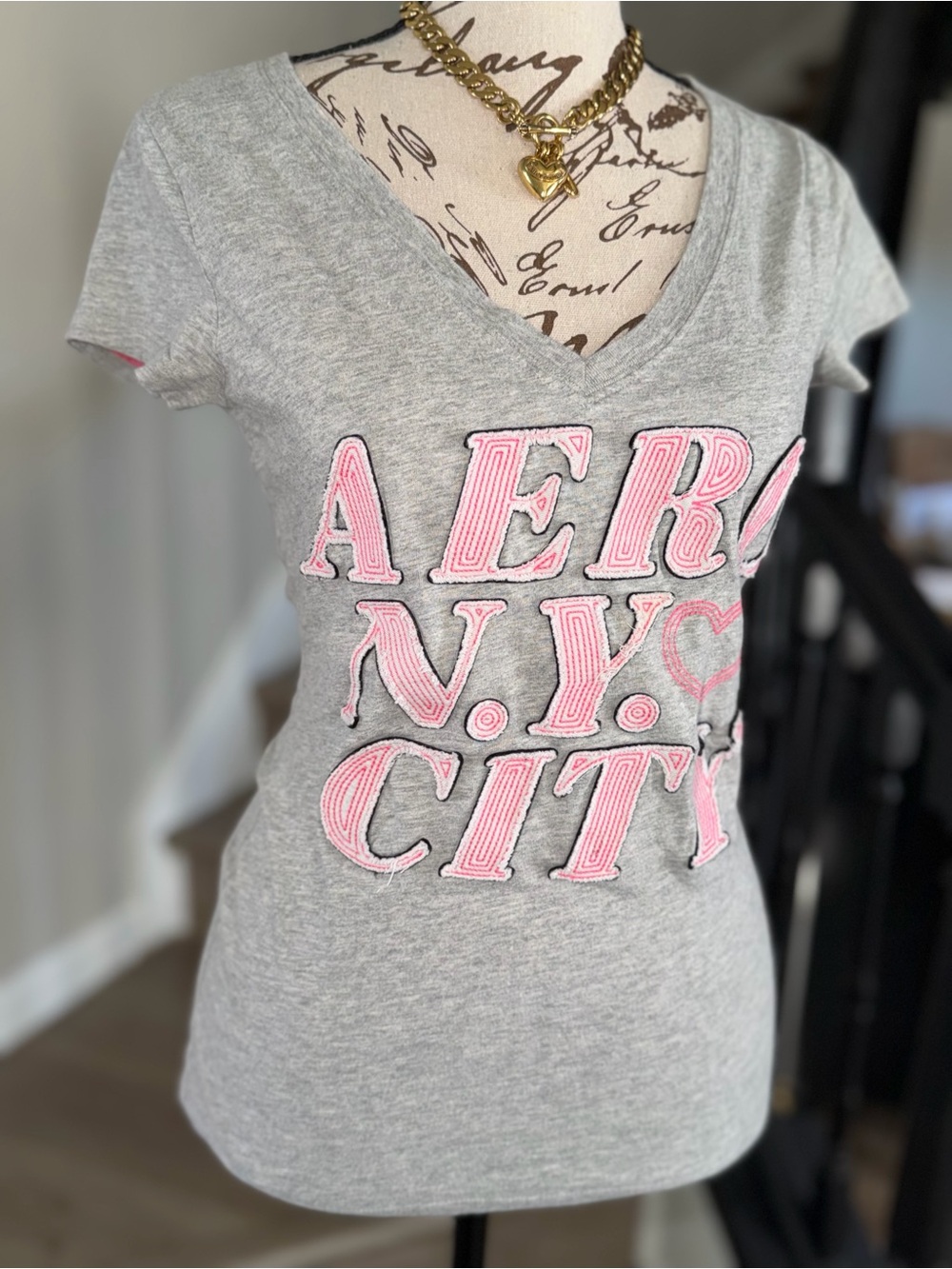Aero Gray V-Neck Tee with Pink Appliqué Logo
